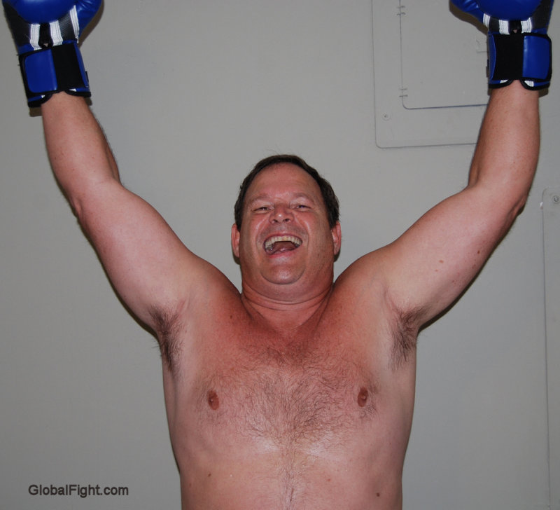 a hot daddy boxer raising arms.jpg