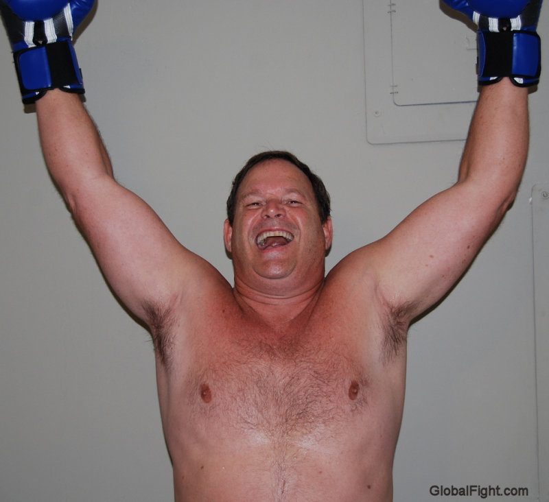 boxer man boxing arms raised victory.jpg