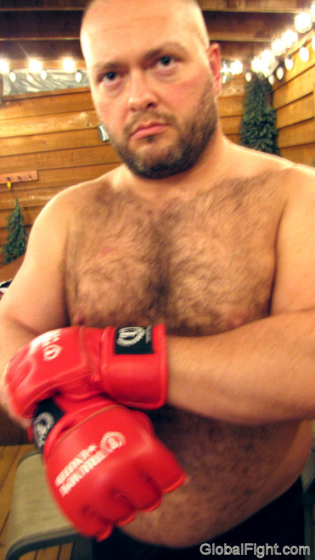 hairybear putting on boxing gloves burly man.jpg
