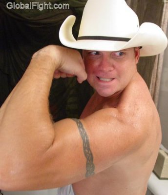 cowboy muscle man flexing.jpg