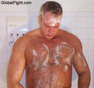 soapy muscle man showering.jpg