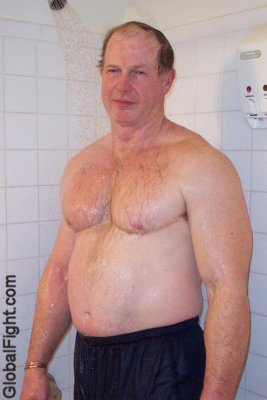 wet muscle man showering.jpg