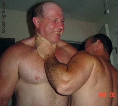wrestler choking wrestling buddy.jpg