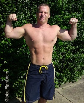 muscle jock posing flexing.jpg