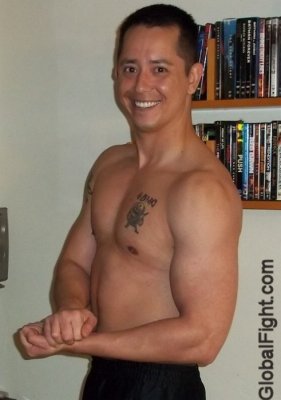 fighting man tattoos chest.jpg