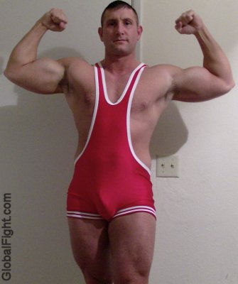 biceps flexing singlets wrestler.jpeg