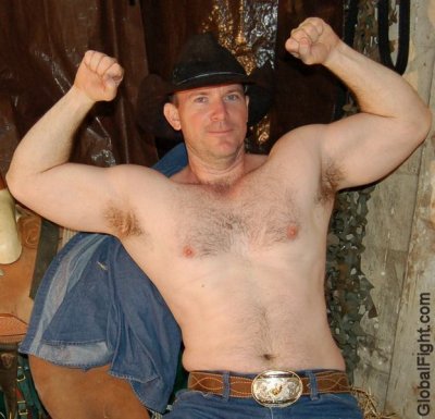 cowboy flexing big biceps.jpg