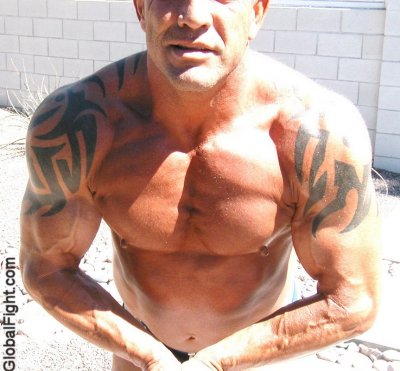 tattooed shoulders muscle tanned.jpeg