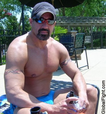 tattoos leather daddy suntanning.jpg
