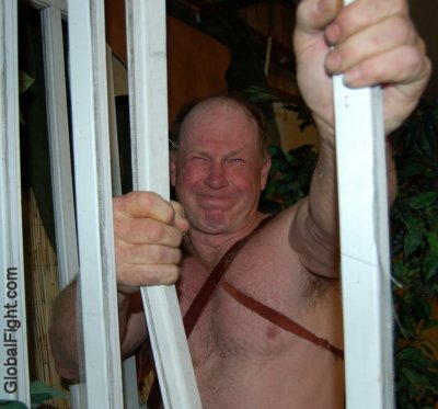 caged older bondage man.jpg