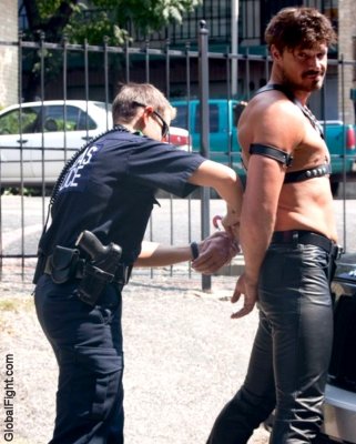 leather man folsom being arrested gay men handcuffed.jpg