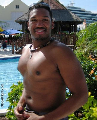 black muscle dude wrestler poolside tanning.jpg