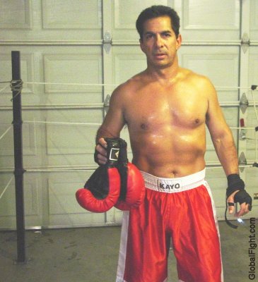 boxer man wrapped hands holding gloves.jpg