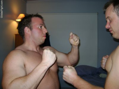 hairy bulged muscular beefy man fighting fists up.jpg
