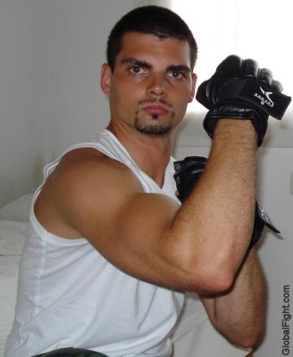 hispanic gay boxer fists up fighting pose stance.jpg