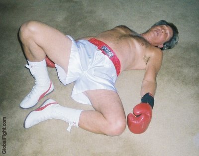 knocked out boxing olderman.jpeg