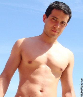handsome jockey boy jocks walking beach.jpg