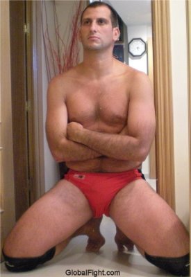 tanned muscle hunk boy arms crossed.jpg