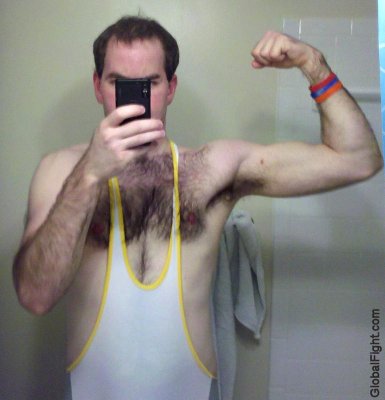 wet sweaty hairy wrestling boy in singlets posing.jpg