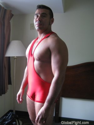 wrestler tight wrestling singlet posing dressing room.jpg