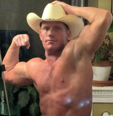 muscle flexing cowboy big biceps hot chest.jpg