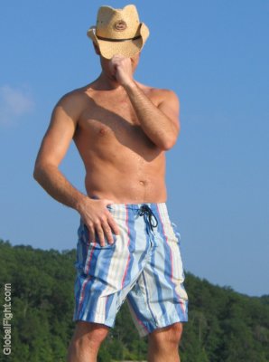 wet gay cowboy swimming ocean beach island man.jpg