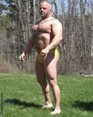 huge bodybuilder beefy strongman men posing flexing.jpg