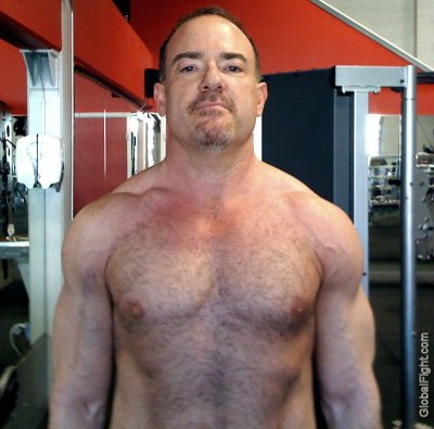 man gay gym flexing no shirt workout.jpg