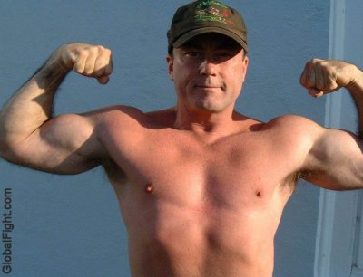 biceps army daddy flexing.jpeg