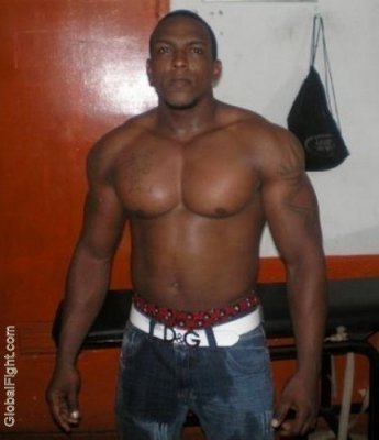 black muscle gay man huge biceps.jpg
