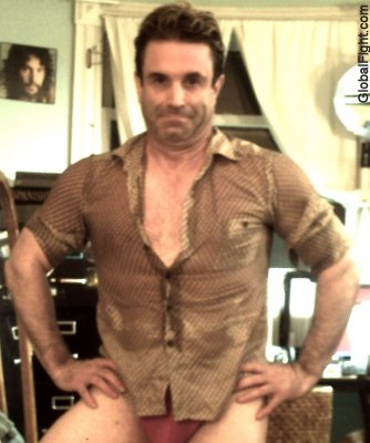 man opening shirt undressing unbuttoning removing.jpg