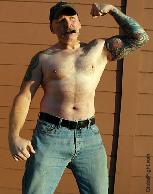 biker cigar pig gay hairychest tattooed leather man.jpg