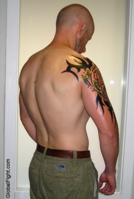 tattooed arms back shoulders tuff wrestling man tough.jpg