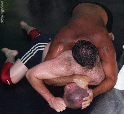 sweaty men wrestling backyard fighting manly guys.jpg