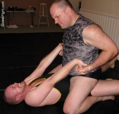 twisting hands neck breakers hairy men wrestling.jpg