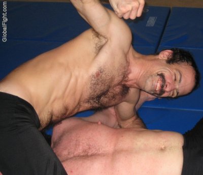 men gut punching pec pounding stomach.jpg