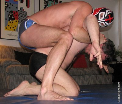 men living room wrestling bedroom matches.jpg