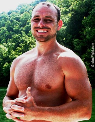 muscle man swimming lake boating nice arms.jpg