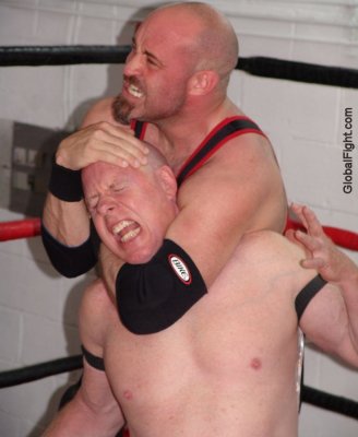 painfull wrestling hold necklock choked manly men.jpg
