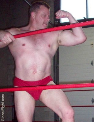 hot muscular powerlifting daddy bear flexing.jpg