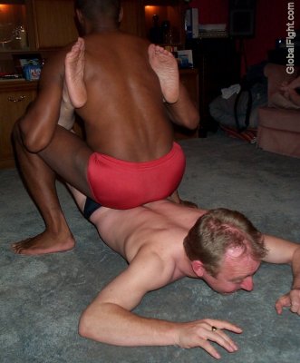 black man dominating whittie wrestling match.jpg