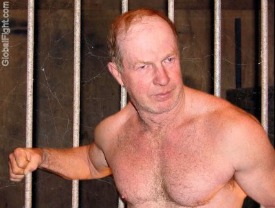 old jail cell man fighting prisoners guys wrestling.jpg