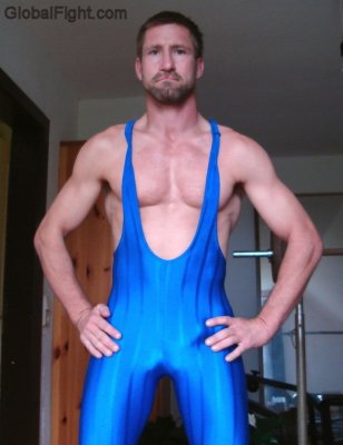 muscle boy wearing wrestling singlet bulged abs chest.jpg