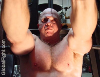 huge triceps biceps muscle daddy bear manly.jpg