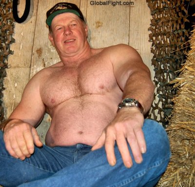 big irish cowboy daddy wearing jeans working barn.jpeg