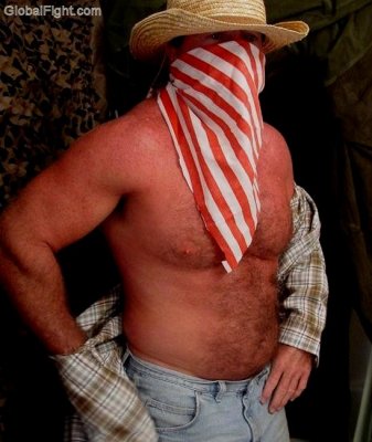 cowboy bandits undressing removing shirt clothes.jpg