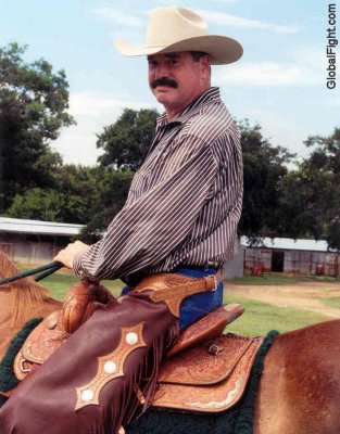 a gay cowboys riding horses chaps moustache pics.jpg