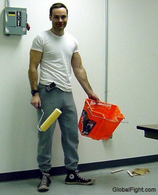 man working painting walls cleaning floors.jpg