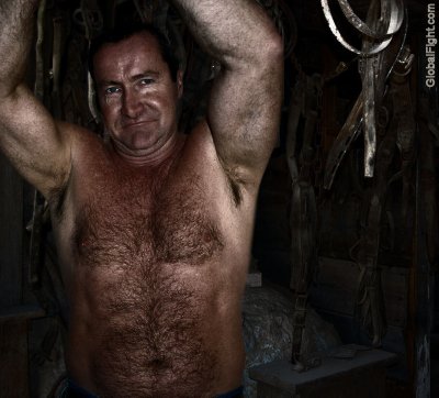 hunky hairy dad working shirtless tool woodshed.jpg