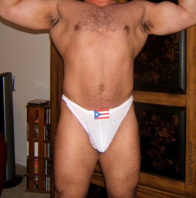 huge musclebear posing gstring seminude pics.jpg